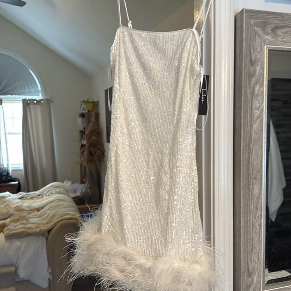 Bought this white sequence, feather dress for my bachelorette party unworn